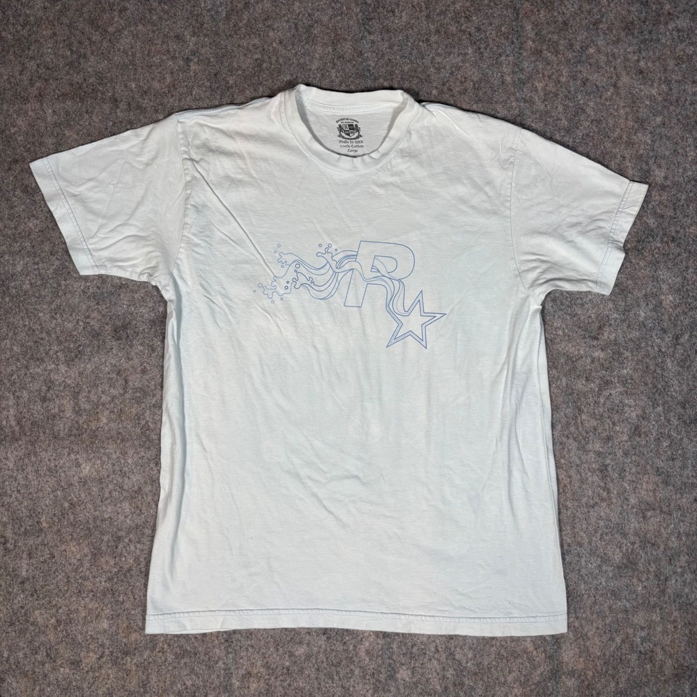 VTG Rockstar Games T Shirt Mens L Blue Shooting Star Logo Cotton Tee Made in USA